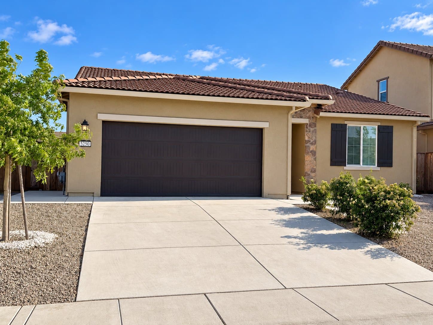 Exterior view of Tahanan Care Home with driveway